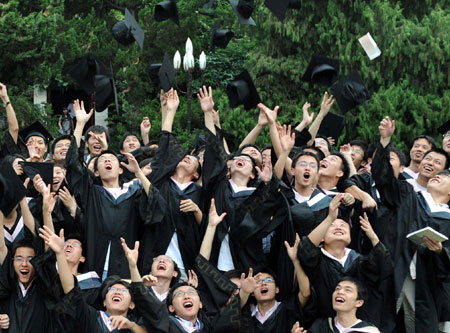 Graduates take commencement photos