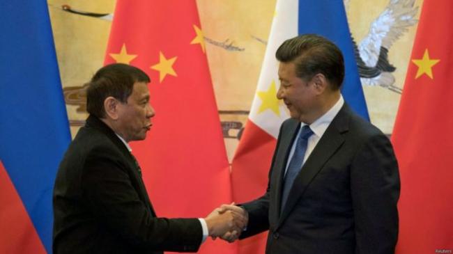 161020071050_china_philippines_leaders_976x549_reuters.jpg