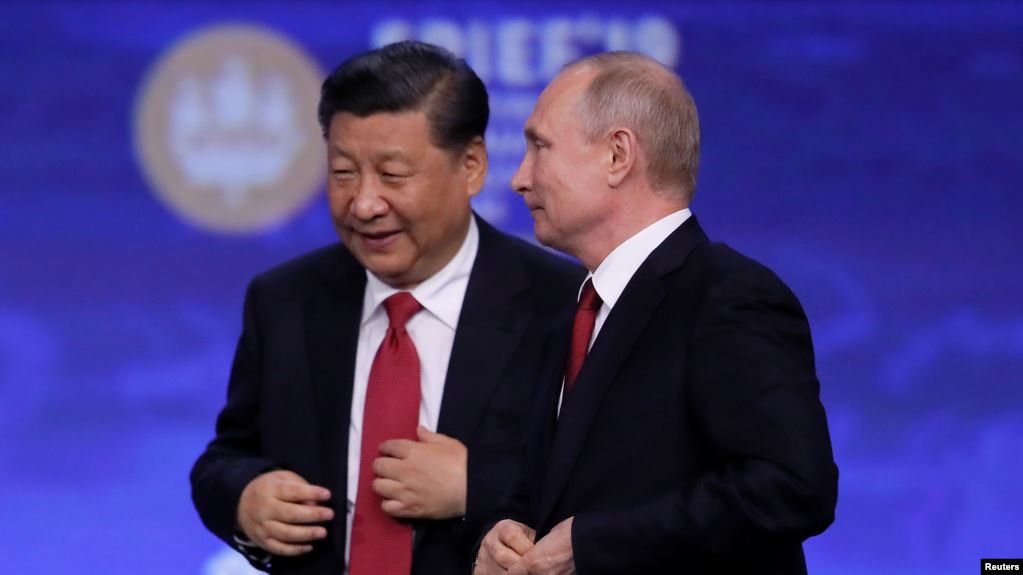 资料照：中国领导人习近平和俄罗斯总统普京在圣彼得堡出席国际经济论坛会议期间。（2019年6月7日）