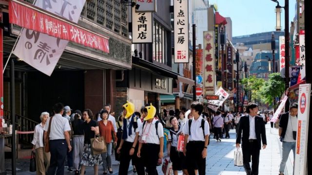 People walk through Chinatown in Yokohama