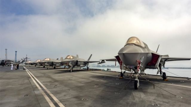 ockheed Martin F-35B Lightning II combat aircrafts of the US Marine Fighter Attack Squadron 211 (VMFA 211) on the flight deck of the HMS Queen Elizabeth at the port of Limassol, Cyprus, 01 July 2021.