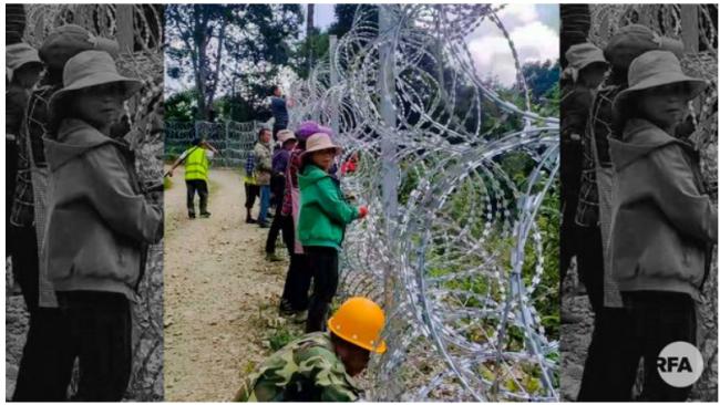中越边界隔离网将通高压电 越南警方派边民拆网