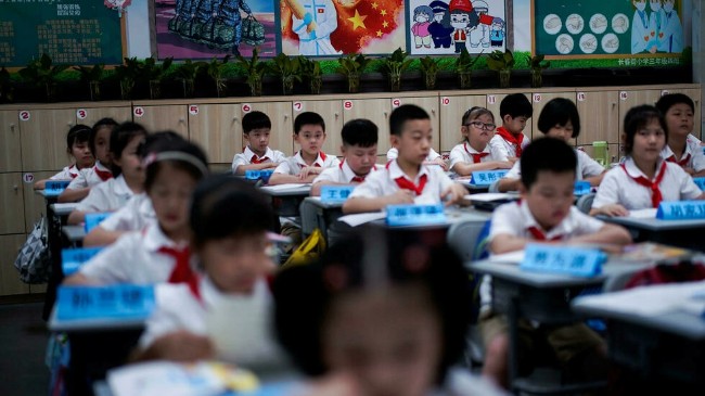 中国推家庭教育促进法：政府和家长共促“双减”