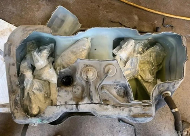 The rental gas tank cut open to reveal dozens of concealed handguns, seized as part of a cross-border investigation between Toronto police, the Canada Border Services Agency and the U.S. Bureau of Alcohol Tobacco and Firearms.