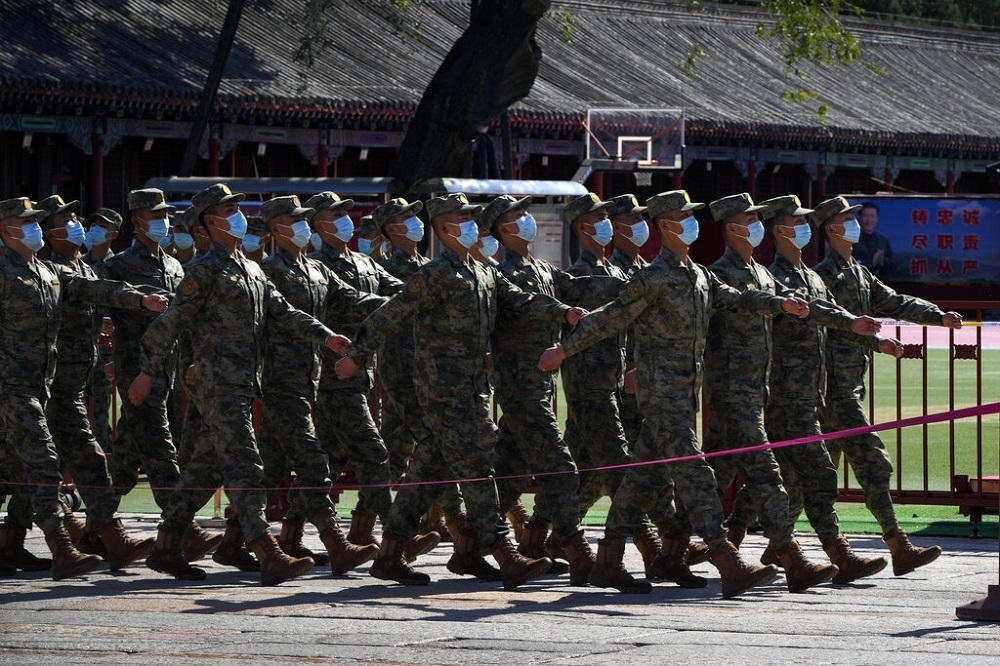 圖為中國解放軍參與中共二十大的開幕活動。（資料照片／美聯社）