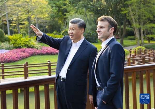 馬克宏訪問中國期間受到習近平熱情款待。 圖：翻攝自新華社