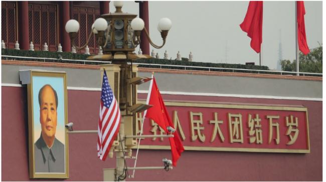 美宣布起诉两华人，其中一人已逃回中国