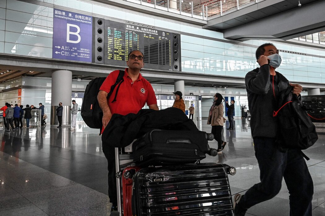 北京首都国际机场的旅客，摄于今年3月。