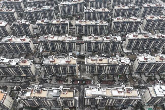 中国重拾社会主义住房观以解决房地产危机