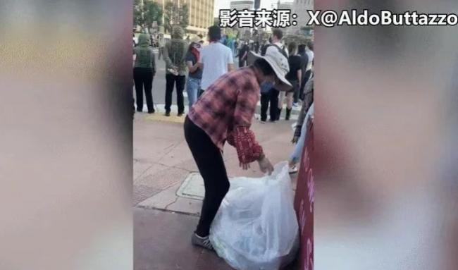 无视身旁“打”“砸”暴乱 华人大妈淡定捡废瓶