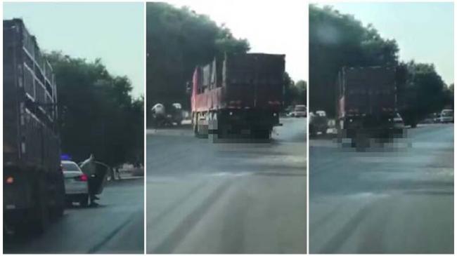 中国交警强行拦车 被大货车直接碾压场面骇人 中国交警强行拦车 被大货车直接碾压场面骇人