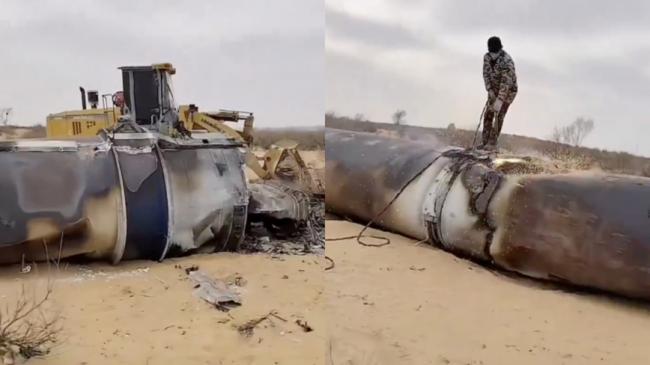 中国废品站老板连收4枚火箭 引发热议 中国废品站老板连收4枚火箭 引发热议