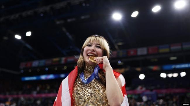 ���˹ھ��������븸�� VOAר��