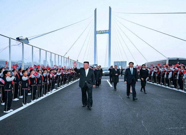 怕习说话不算数,金正恩闪电访中 怕习说话不算数,金正恩闪电访中